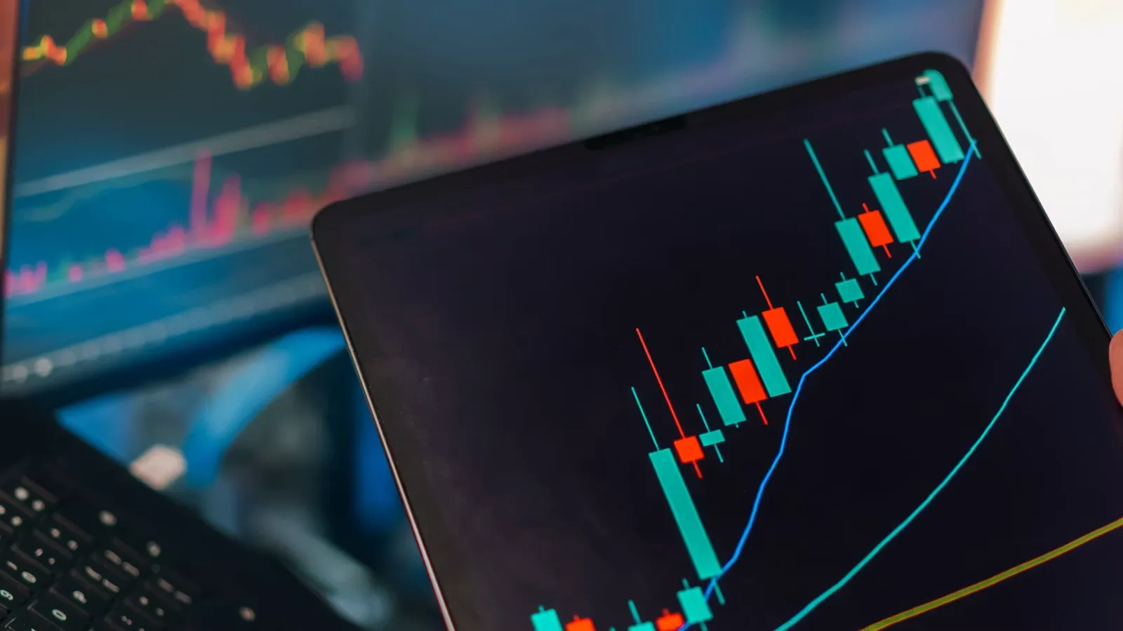 Multi-screen research workspace used to backtest and validate trading strategies