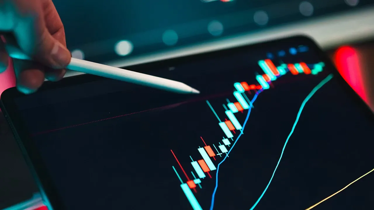 Investor building a portfolio that mirrors a target allocation on a laptop