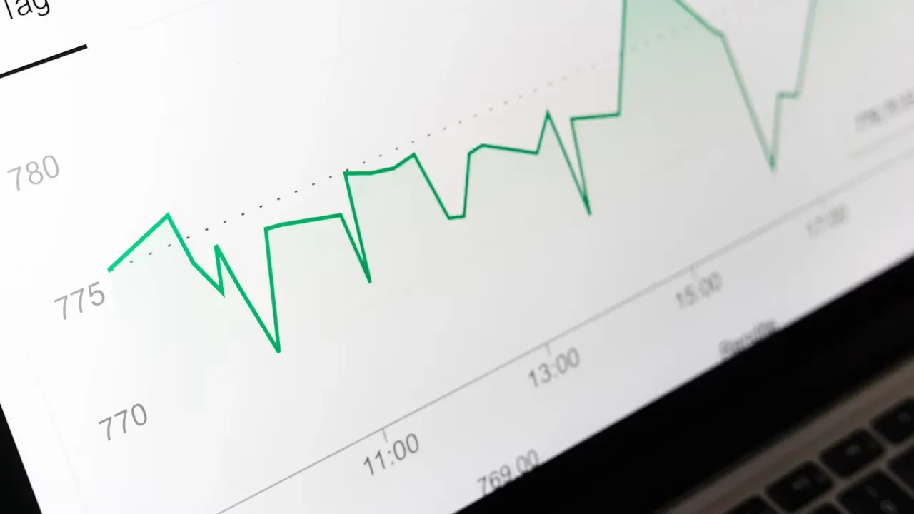 Quantitative trader comparing algorithmic strategies by risk-adjusted performance