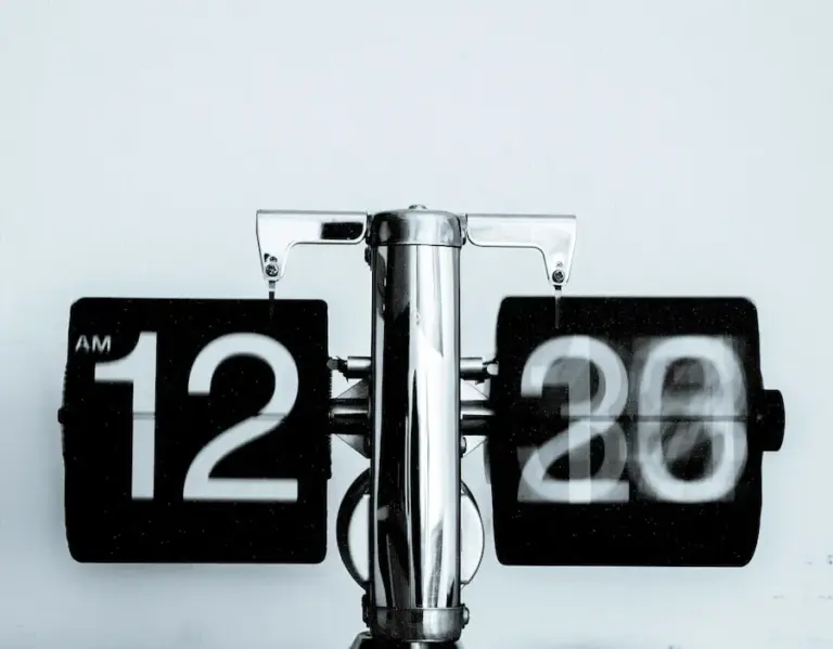 An analog clock marking the hour