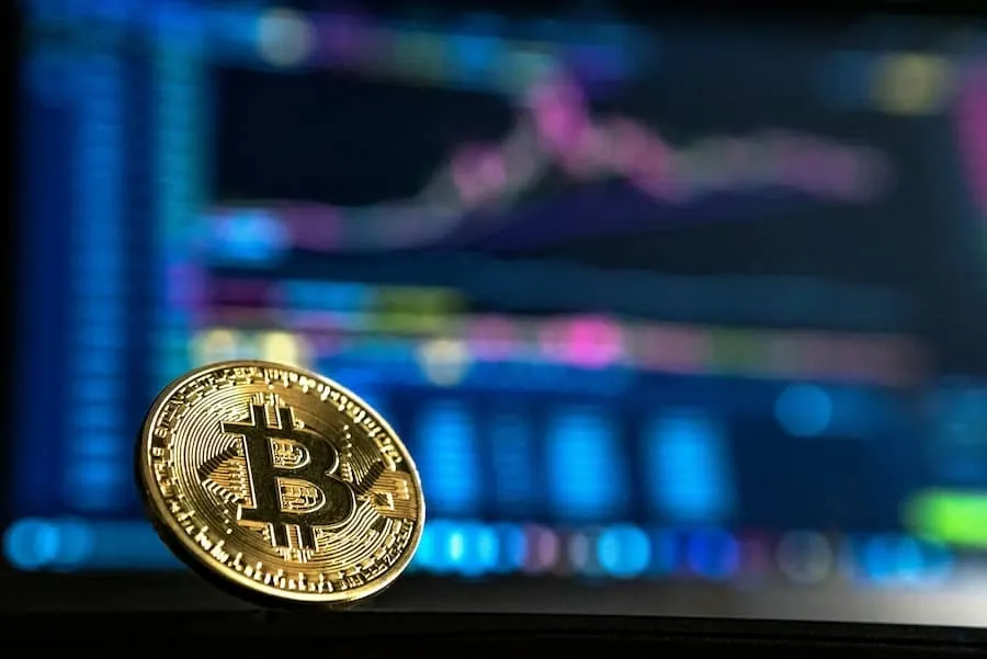 A gold-colored coin on a surface