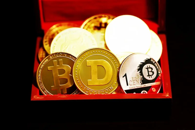 A red box filled with coins