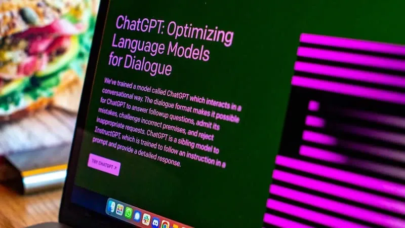 A laptop showing an AI assistant