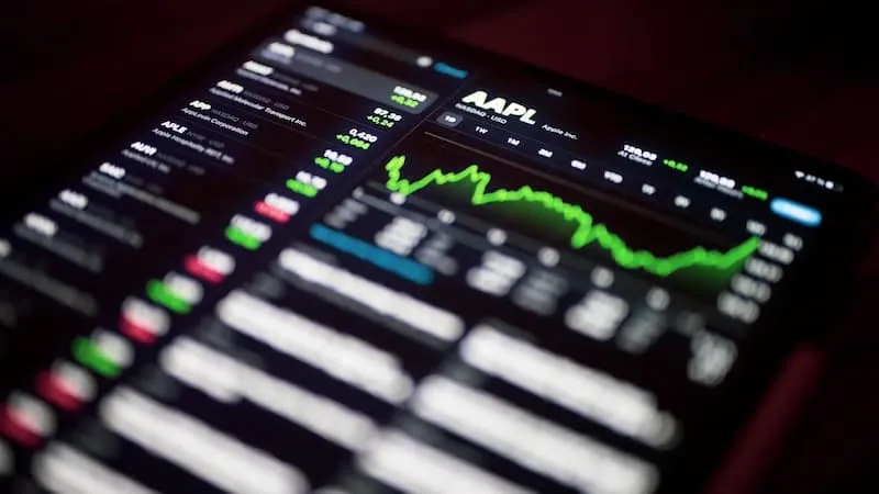 A phone showing a stock chart