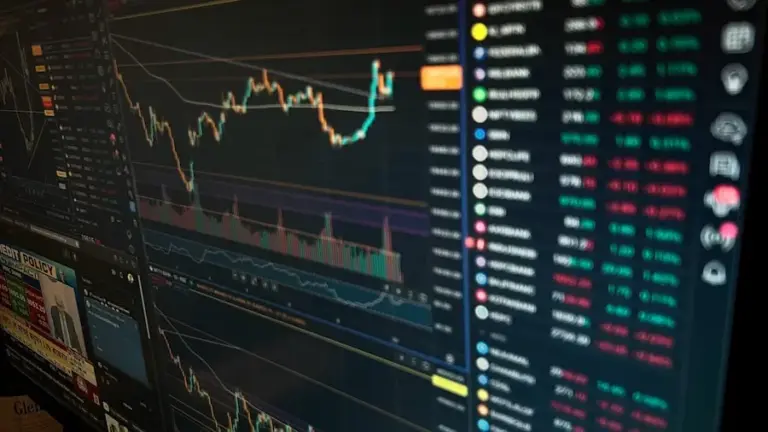 A computer screen displaying market data and charts