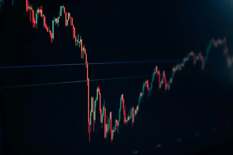 A candlestick chart on a dark screen