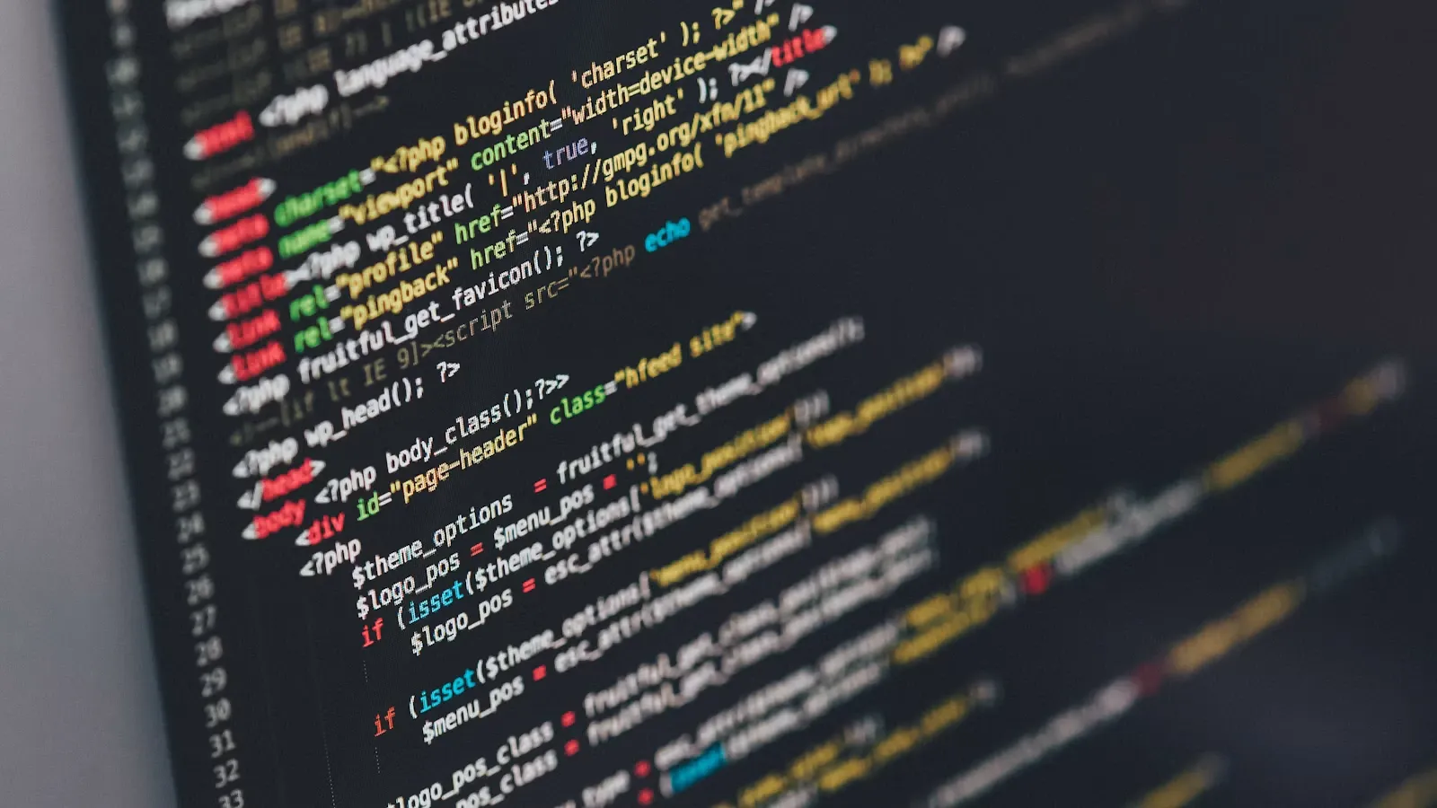 A laptop screen showing code