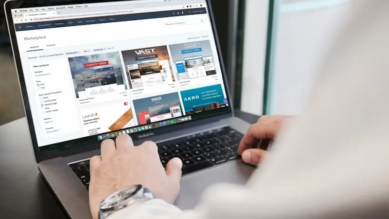 A person analyzing data on a laptop