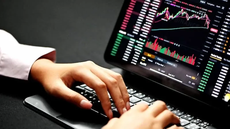 A laptop with market data