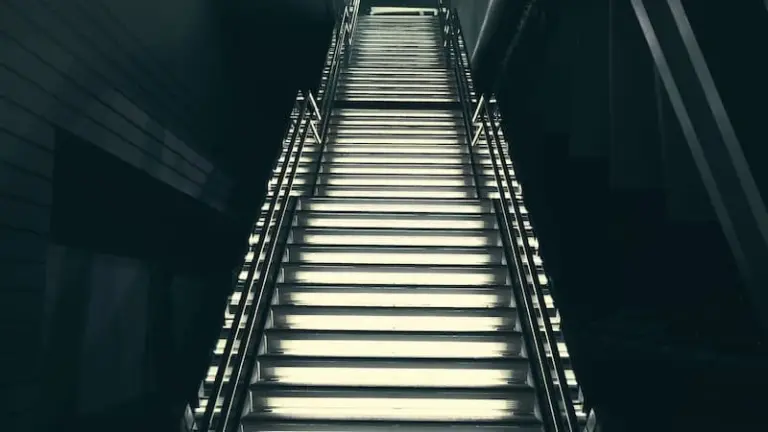 A low-angle view of gray steps rising upward
