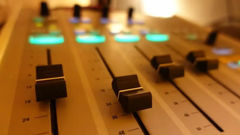Faders on a mixing console