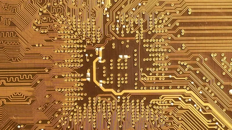 A circuit board with gold pathways