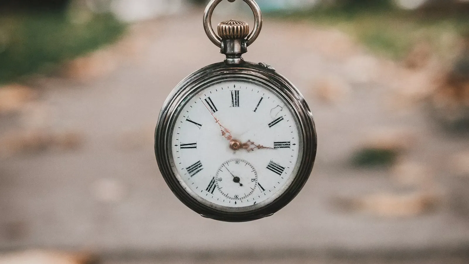 A pocket watch showing the time