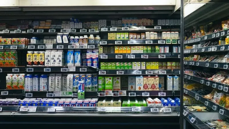 Shelves stocked with food and beverages