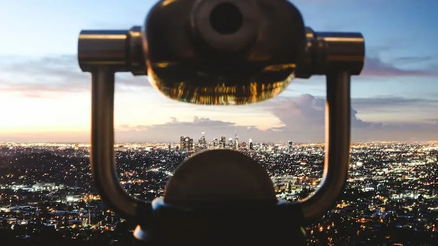 A brass telescope pointed toward the horizon