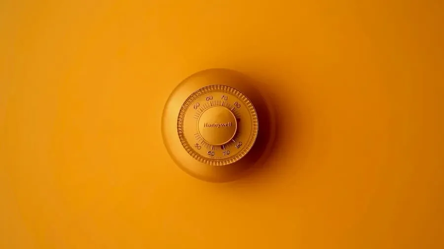 A wall-mounted thermostat dial