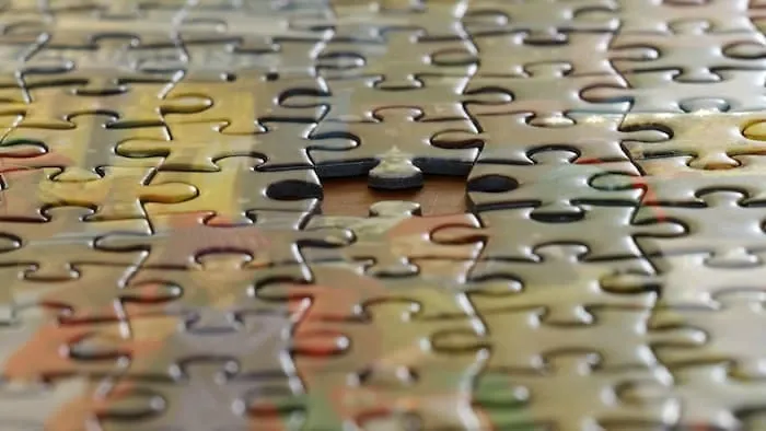 Close-up of interlocking jigsaw puzzle pieces